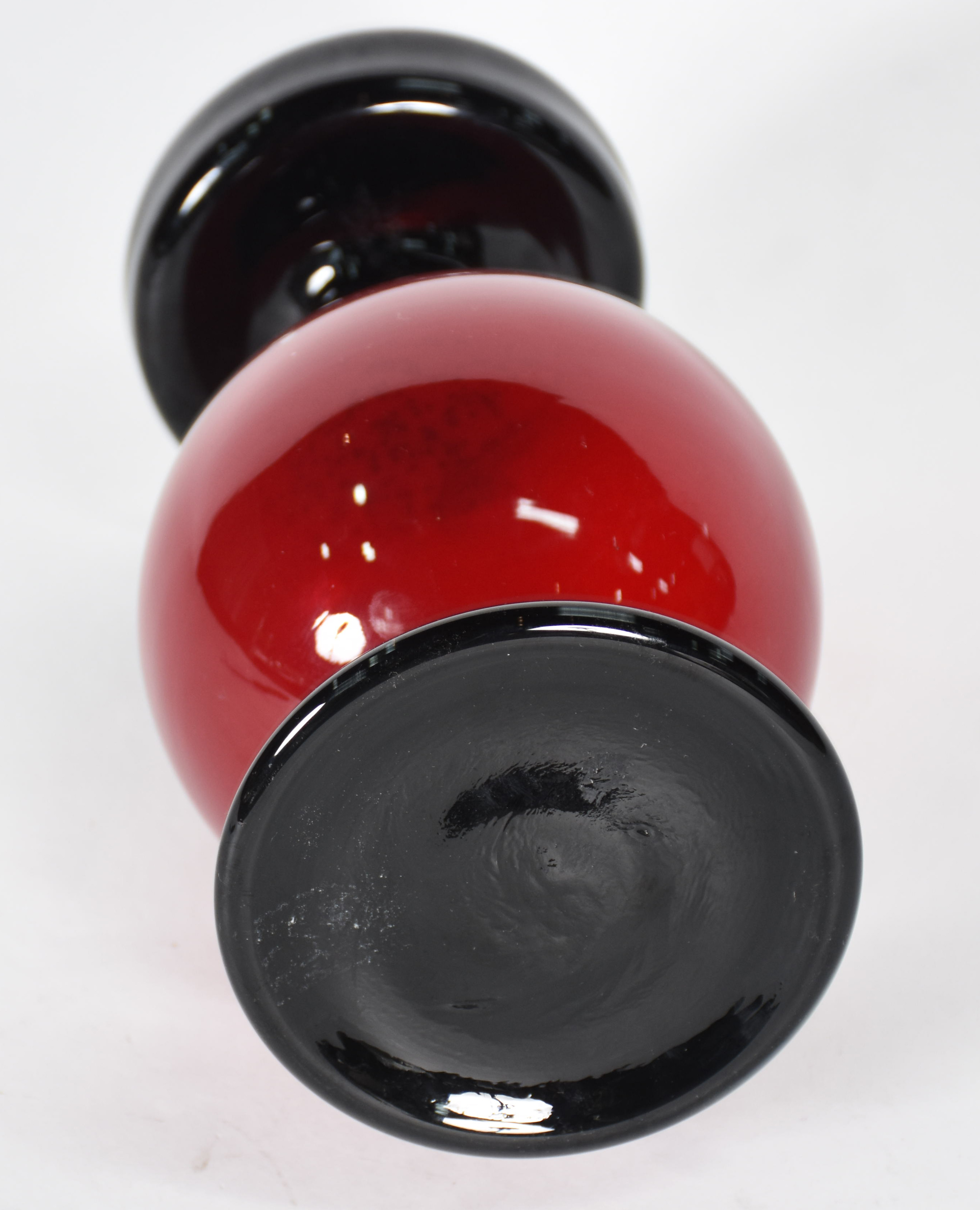 Castiçal de vidro na cor vinho e preta. - foto 3 de 3
