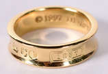 Tiffany & Co. (1837),  - Anel de ouro amarelo 750 marca da famosa grife "TIFFANY", datada 1997, aro 20. (Por questão de  segurança a peça não se encontra na loja).