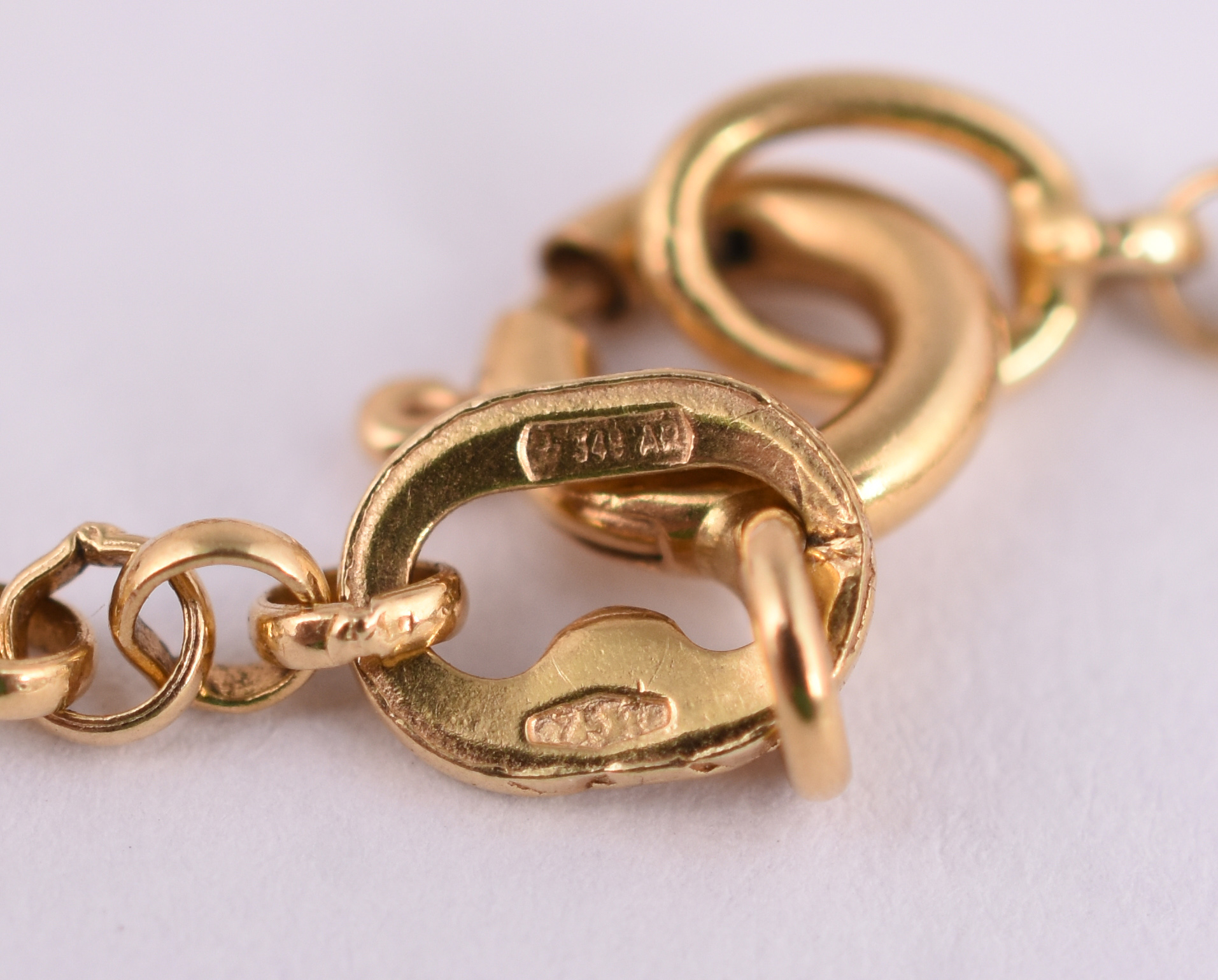Pulseira de ouro amarelo 18 k com pingente. (por questão de segurança... - foto 3 de 4