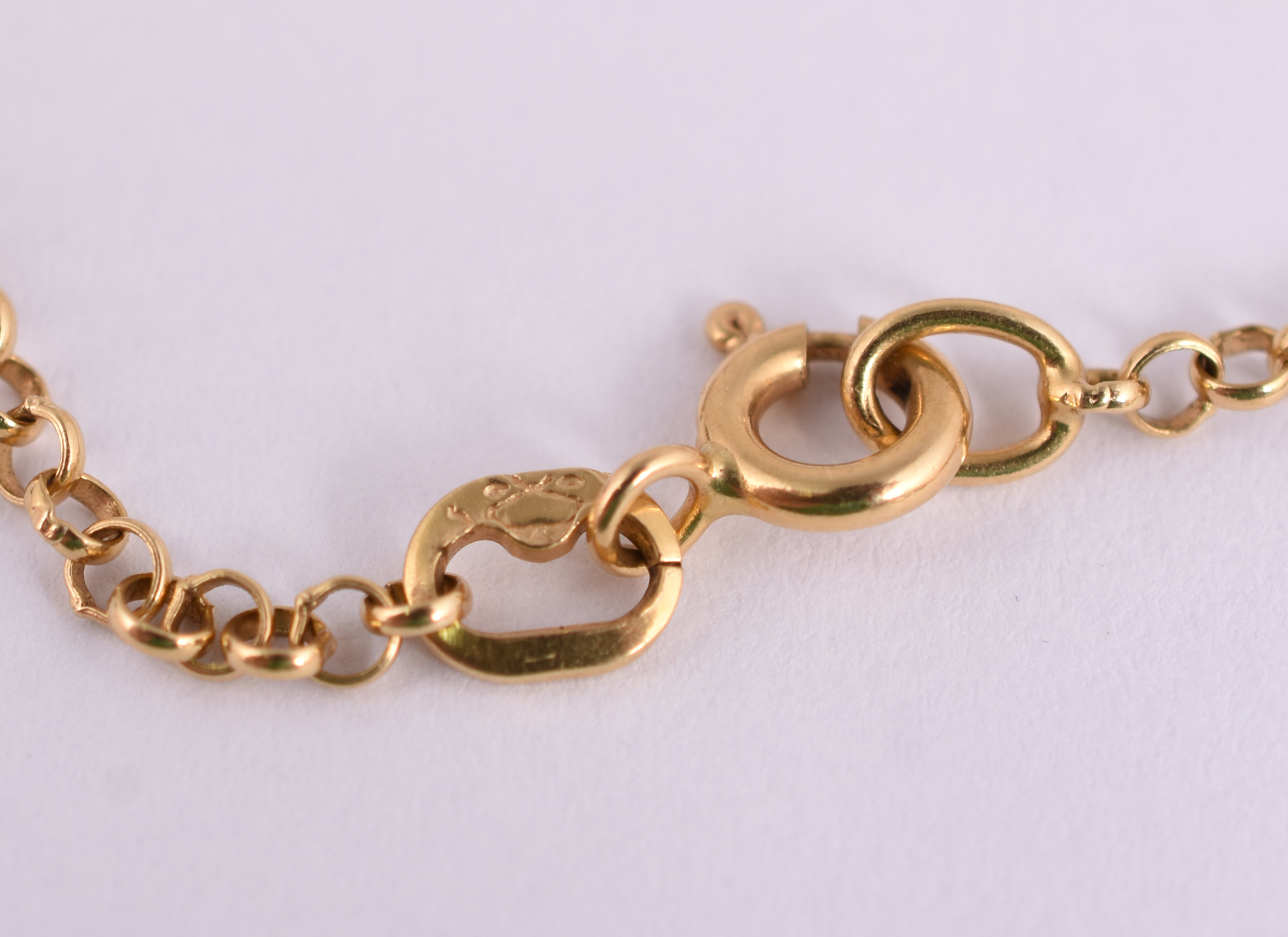 Pulseira de ouro amarelo 18 k com pingente. (por questão de segurança... - foto 4 de 4