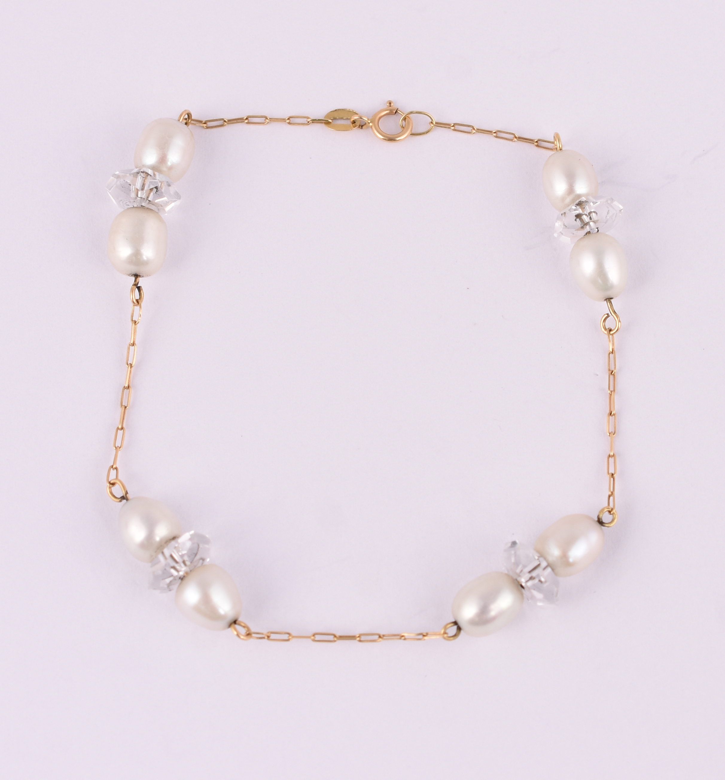 Pulseira de ouro amarelo 18 k com pérolas barrocas e safiras. (por... - foto 1 de 3
