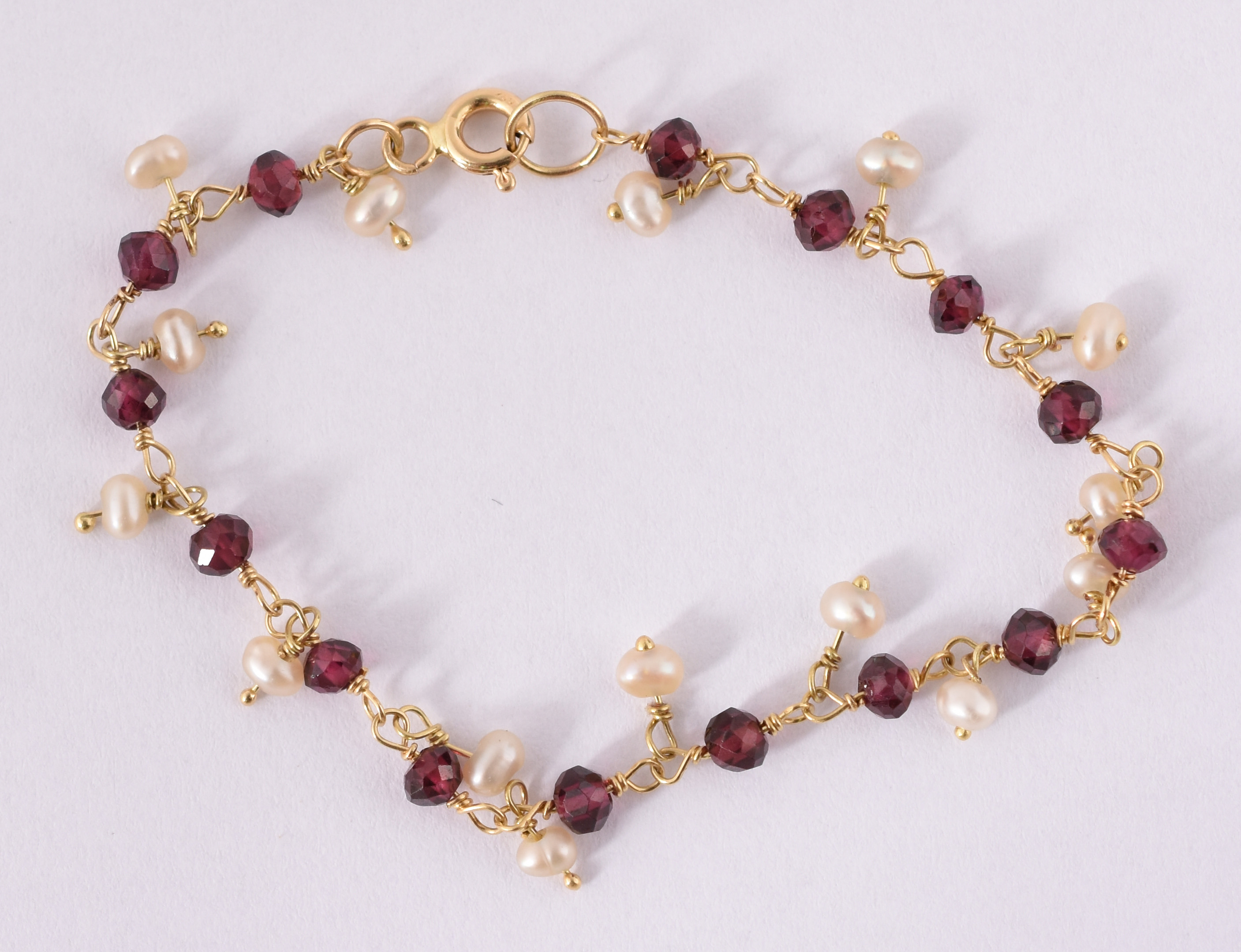 Pulseira infantil de ouro amarelo 750 com mini pedras e pedras... - foto 1 de 3