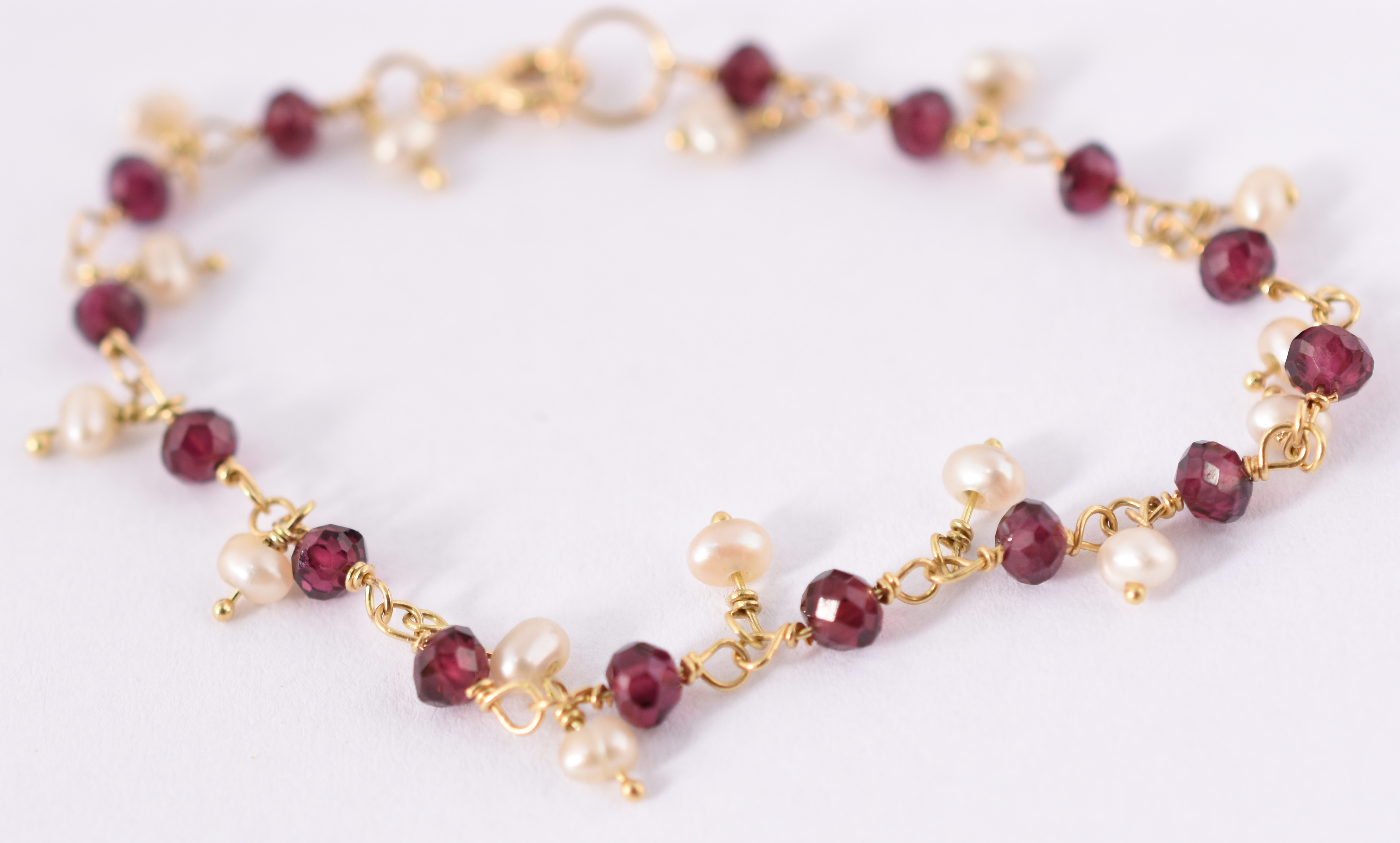 Pulseira infantil de ouro amarelo 750 com mini pedras e pedras... - foto 2 de 3