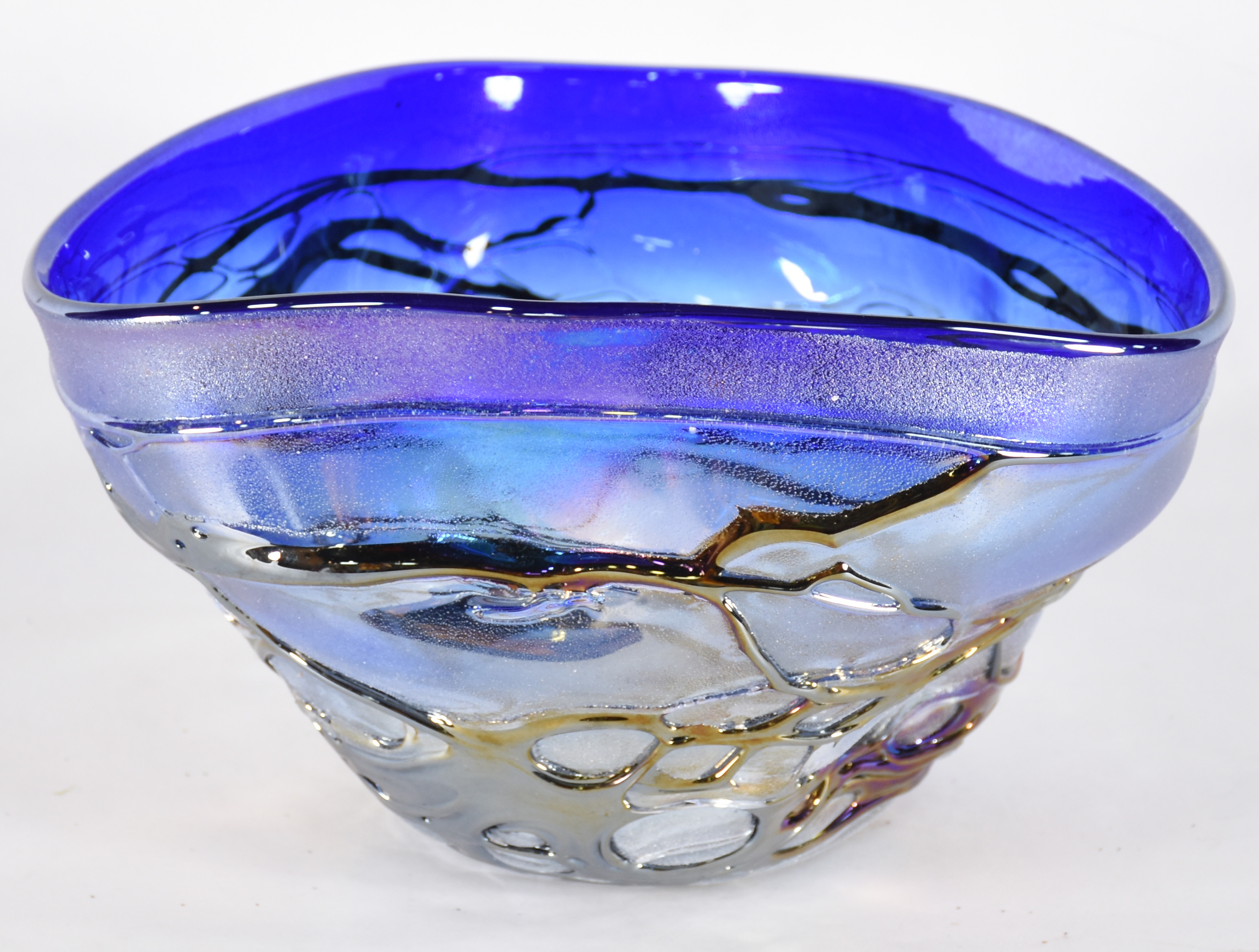 Centro de mesa de vidro decorativo azul com nuances prateadas. - foto 1 de 3