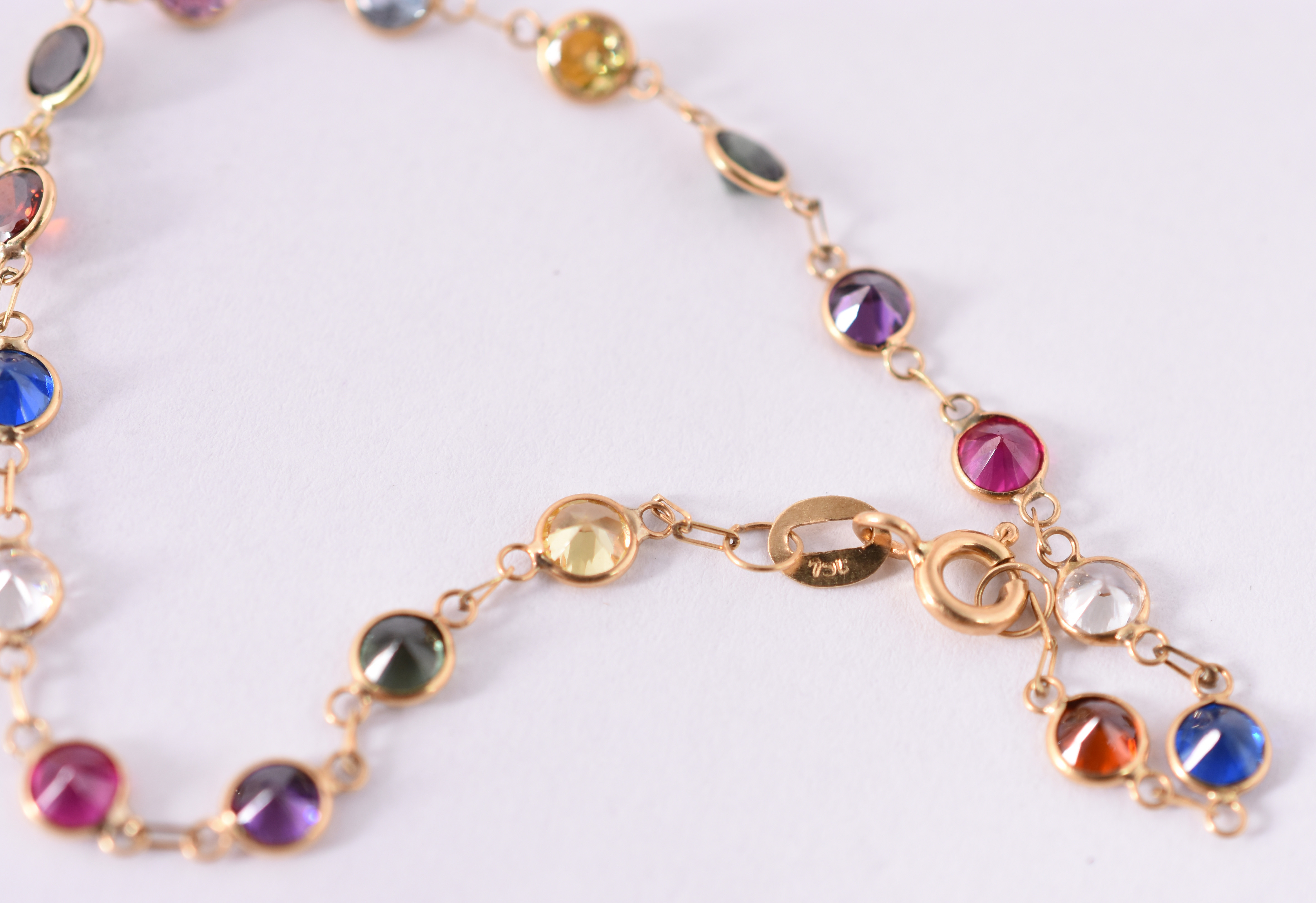 Pulseira de ouro amarelo 750 e pedras coloridas. (Por segurança, a... - foto 2 de 2