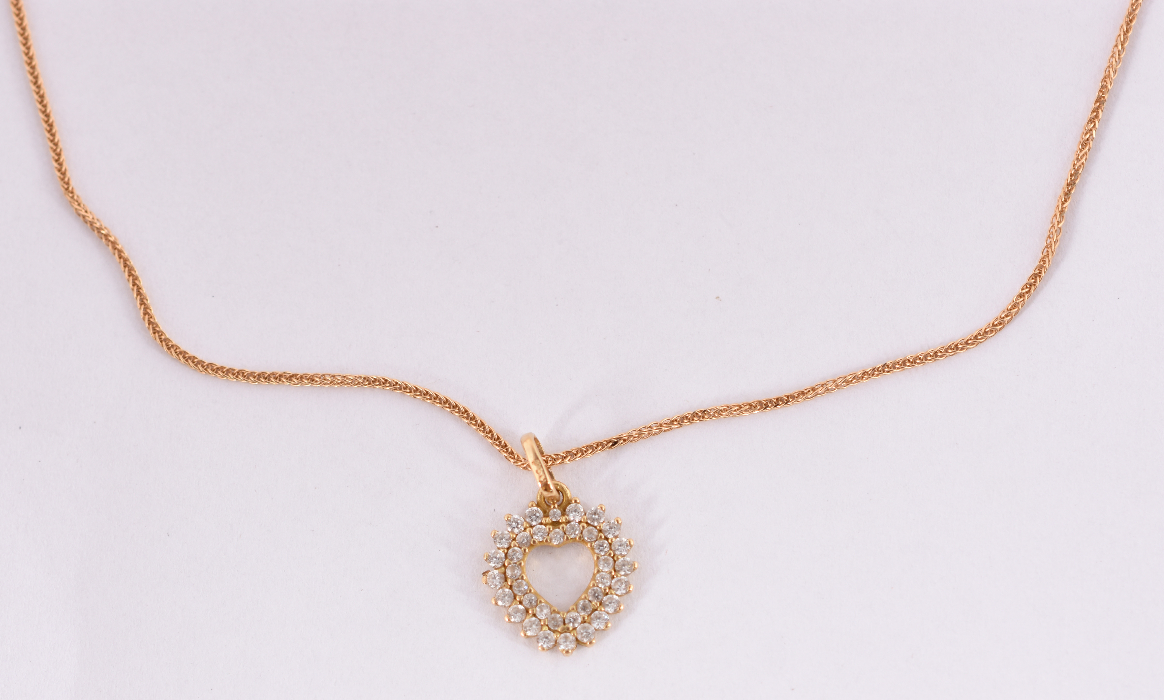 Gargantilha de ouro amarelo 750 e pingente no feitio de coração com... - foto 1 de 4