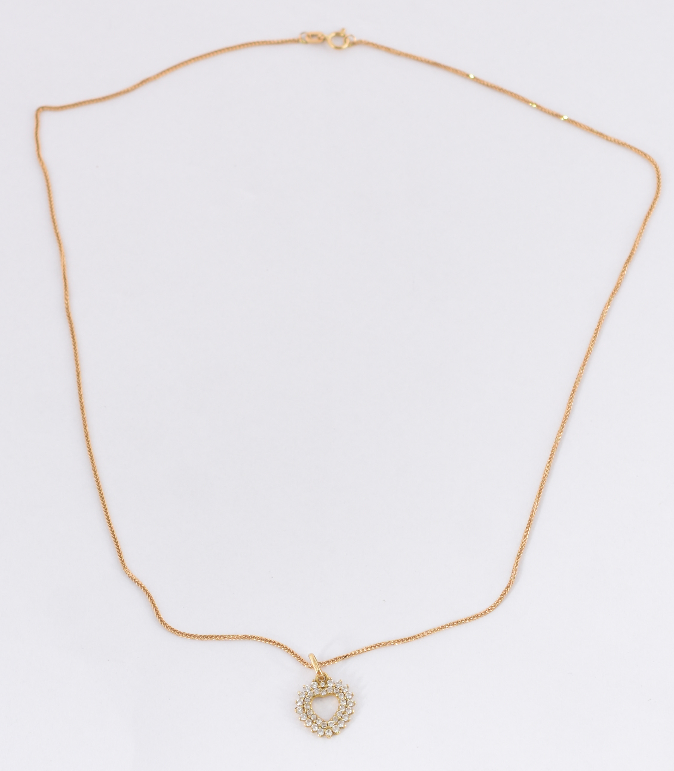 Gargantilha de ouro amarelo 750 e pingente no feitio de coração com... - foto 2 de 4