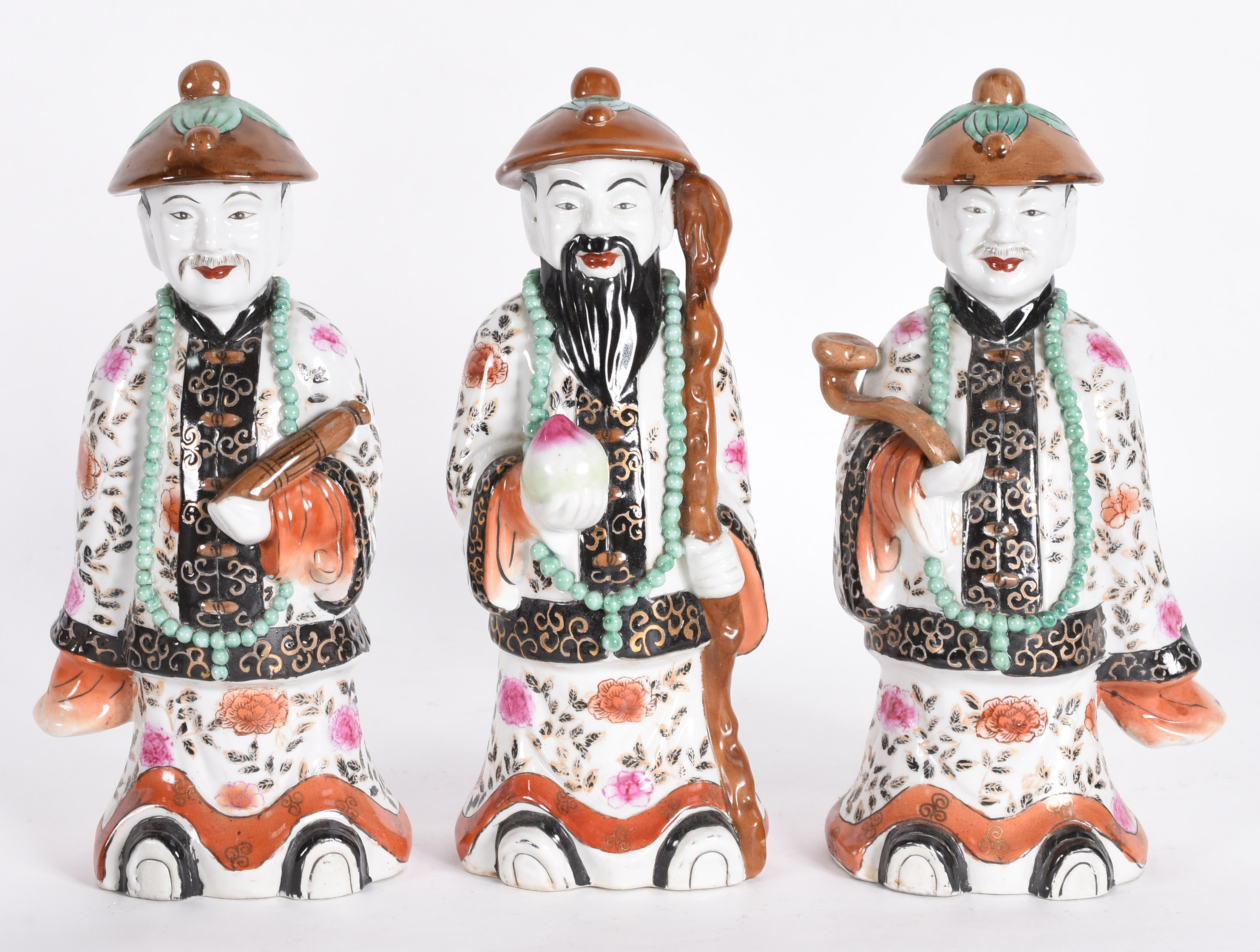 Três estatuetas de porcelana oriental policromada representando... - foto 1 de 5