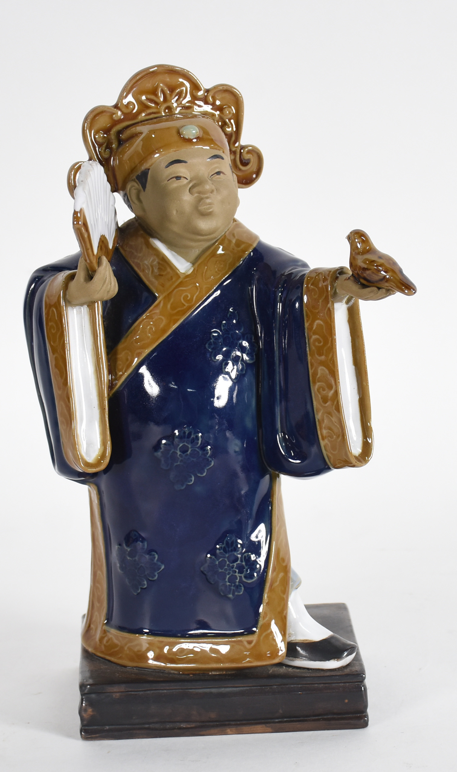 Estatueta oriental de porcelana policromada representando figura... - foto 1 de 4