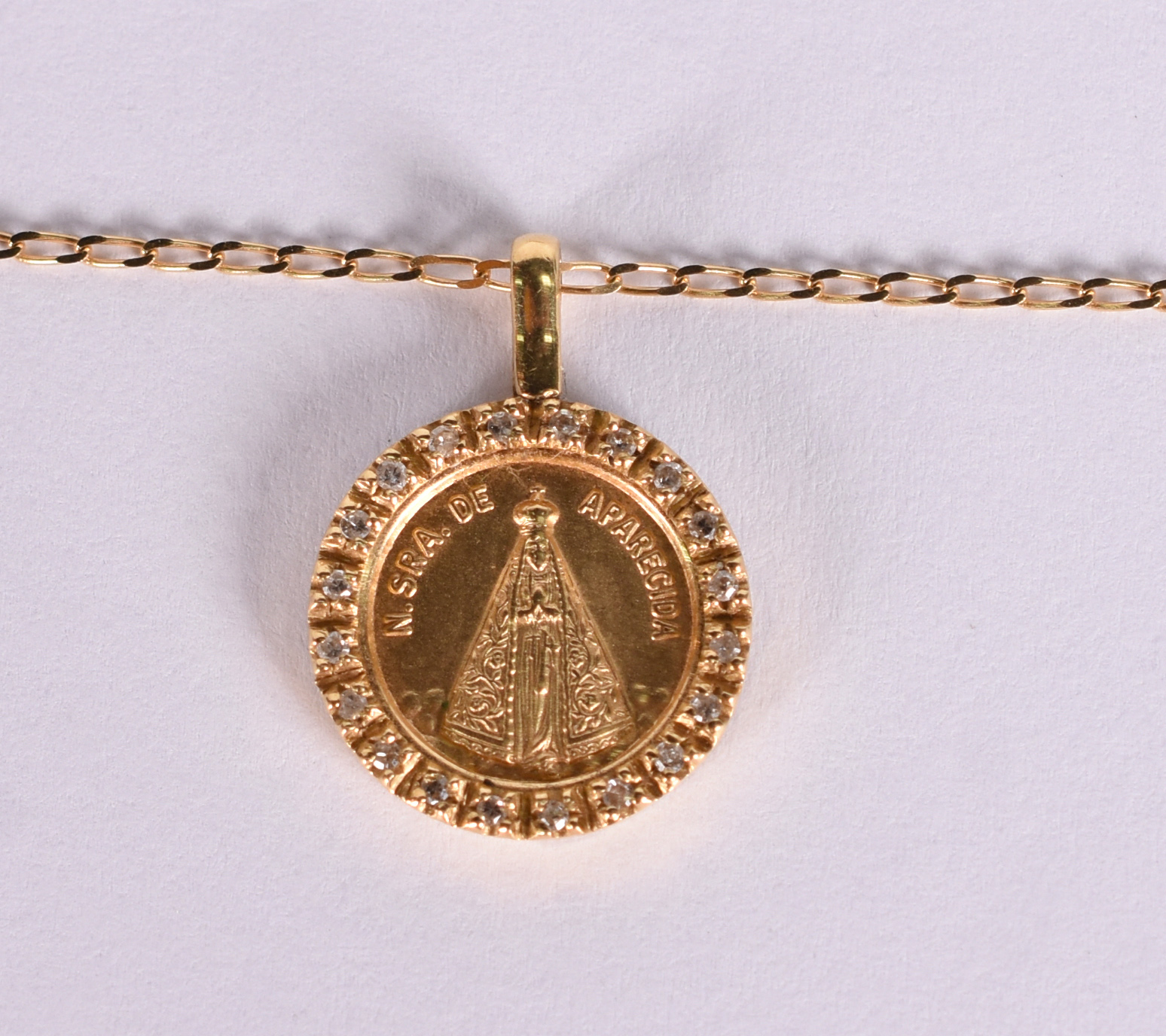 Gargantilha de ouro amarelo 18 k com 20 brilhantes. (Por motivo de... - foto 1 de 4