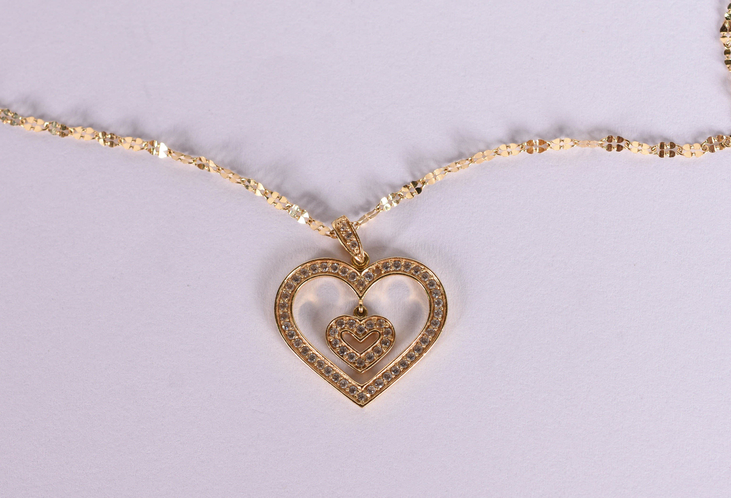 Gargantilha de ouro amarelo 18 k e pingente feitio coração com... - foto 1 de 5