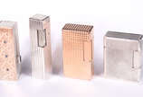 Dupont (1872),  - Tres isqueiros diversos, marcas Dupont, Cartier e Flaminaire, e um porta batom.