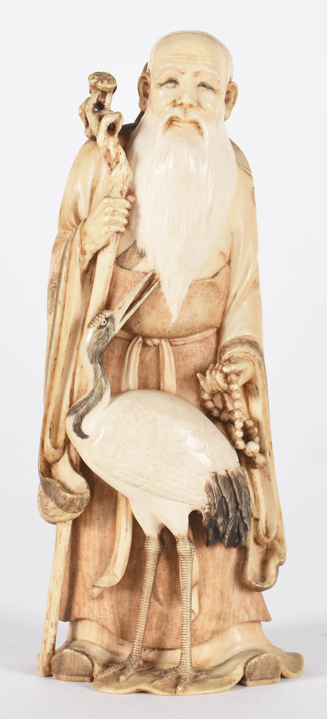 Estatueta de marfim representando homem com garça, século XIX, base... - foto 1 de 3