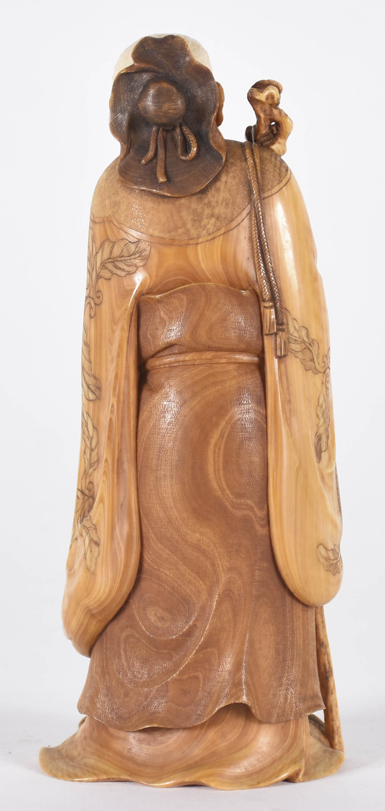 Estatueta de marfim representando homem com garça, século XIX, base... - foto 2 de 3