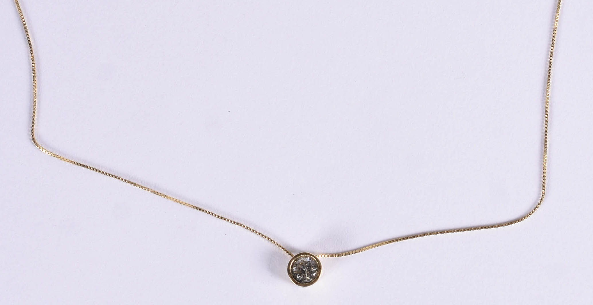 Gargantilha de ouro 18 k com ponto de luz, 1 brilhante de... - foto 1 de 6
