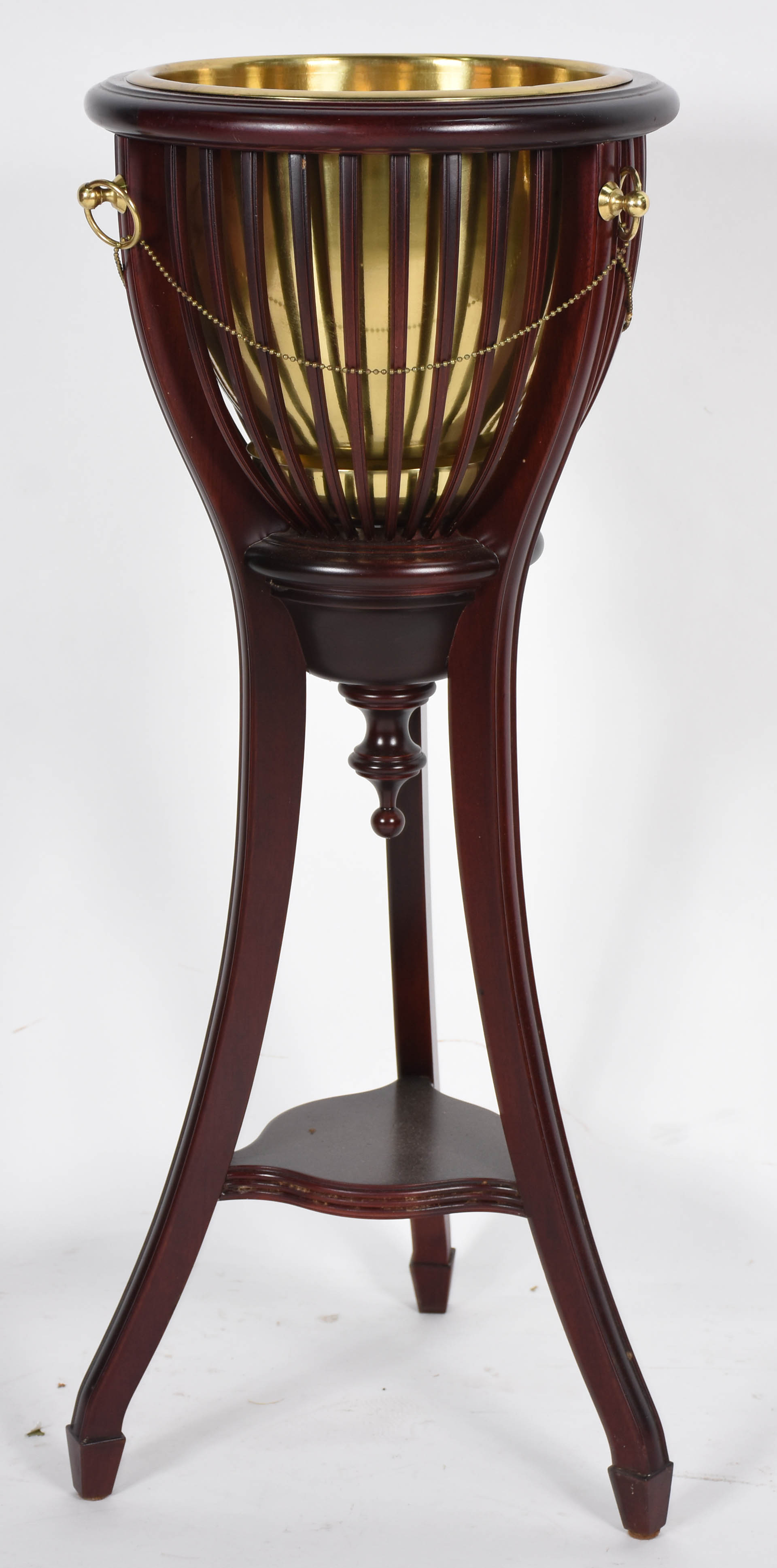 Wine cooler com pedestal de madeira e interior de metal dourado. - foto 1 de 3