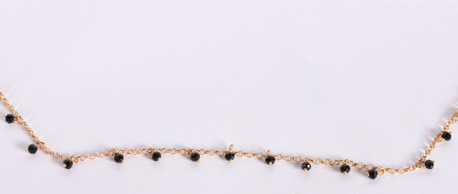 Gargantilha de ouro amarelo com pérolas negras (Por motivos de... - foto 1 de 4