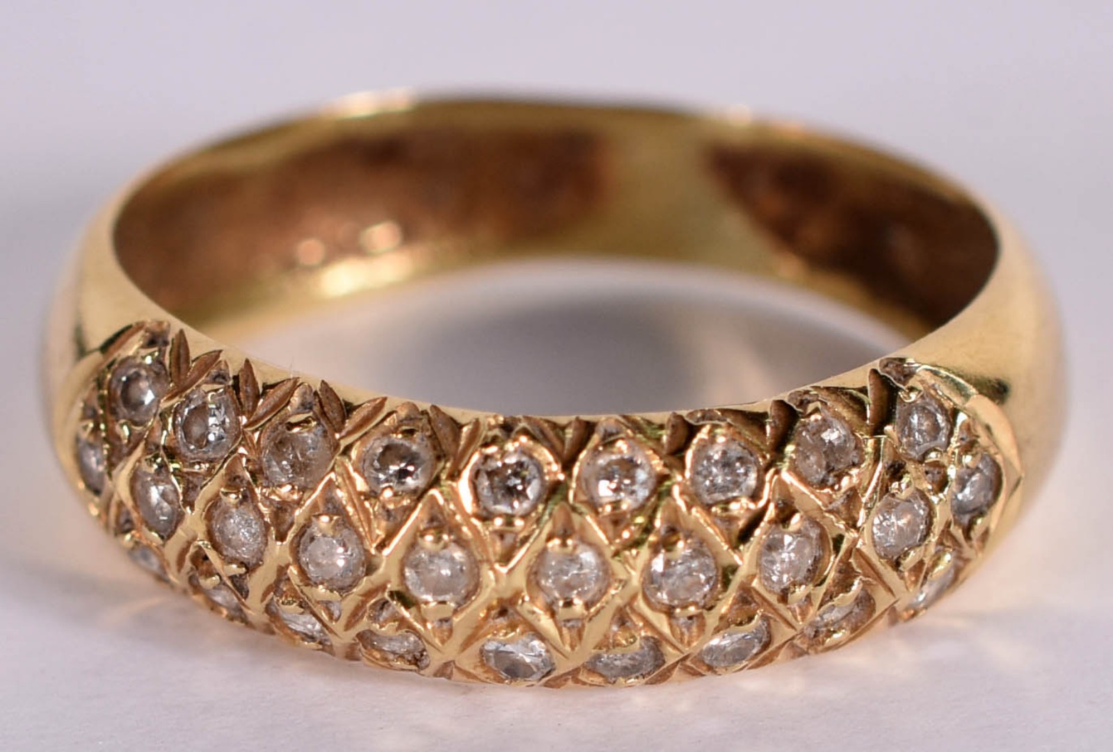 Anel de ouro amarelo 18 k com 27 brilhantes de 0,30 cts, aro 21 (Por... - foto 1 de 4