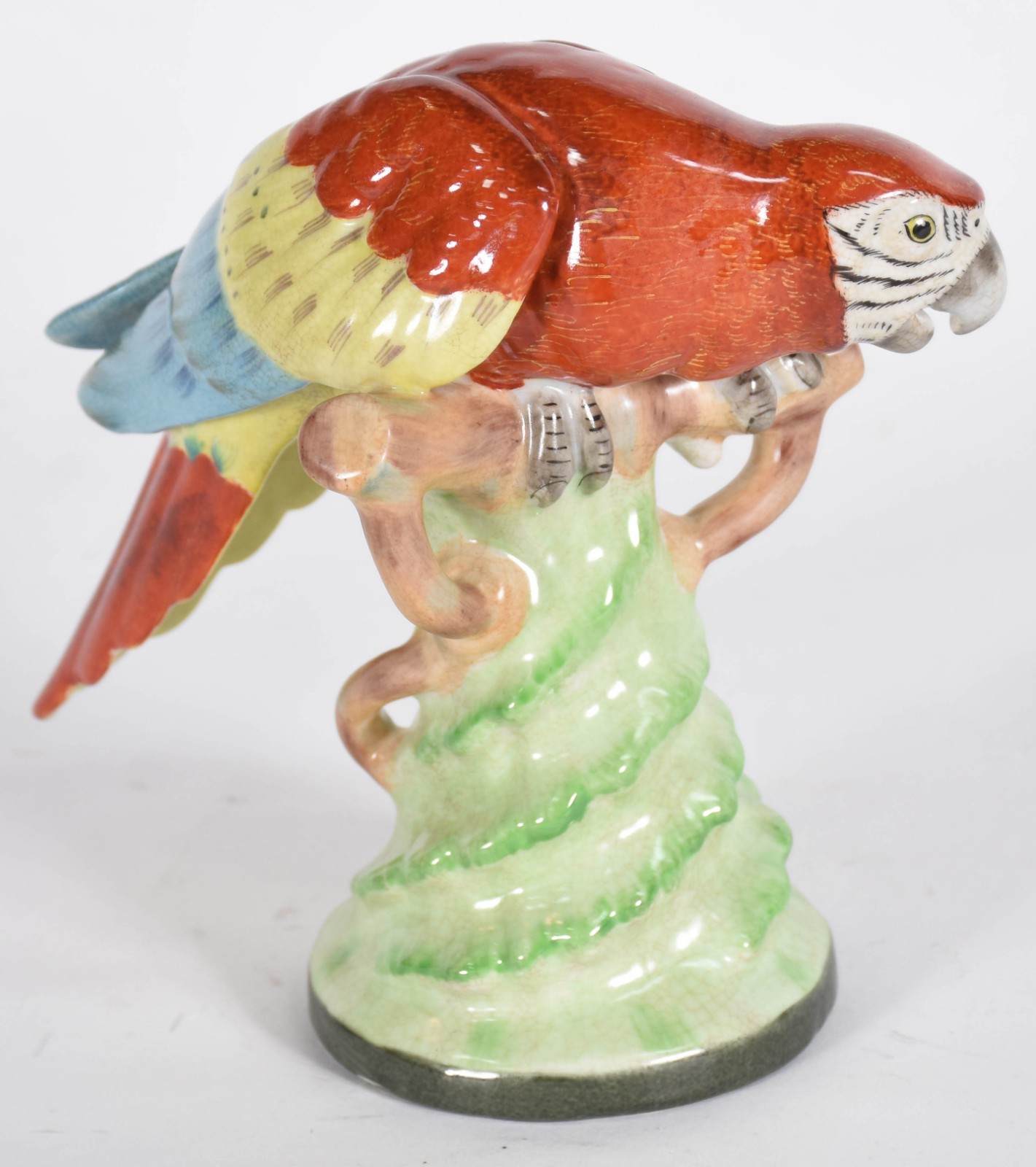 Pássaro de porcelana colorido. - foto 2 de 4