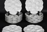 Serviço de porcelana francesa de LIMOGES com 12... - Serviço de porcelana francesa de LIMOGES com 12 pratos para ostras ou vieiras.