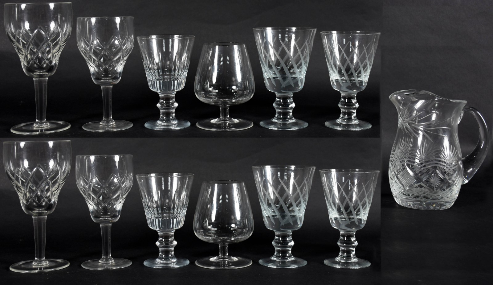 Conjunto de cristal com diversas lapidações, sendo 11 taças lisas... - foto 1 de 6