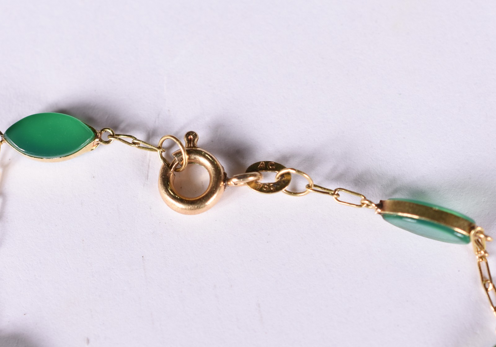 Pulseira de ouro amarelo "750" com pedras verdes (Por motivos de... - foto 2 de 2