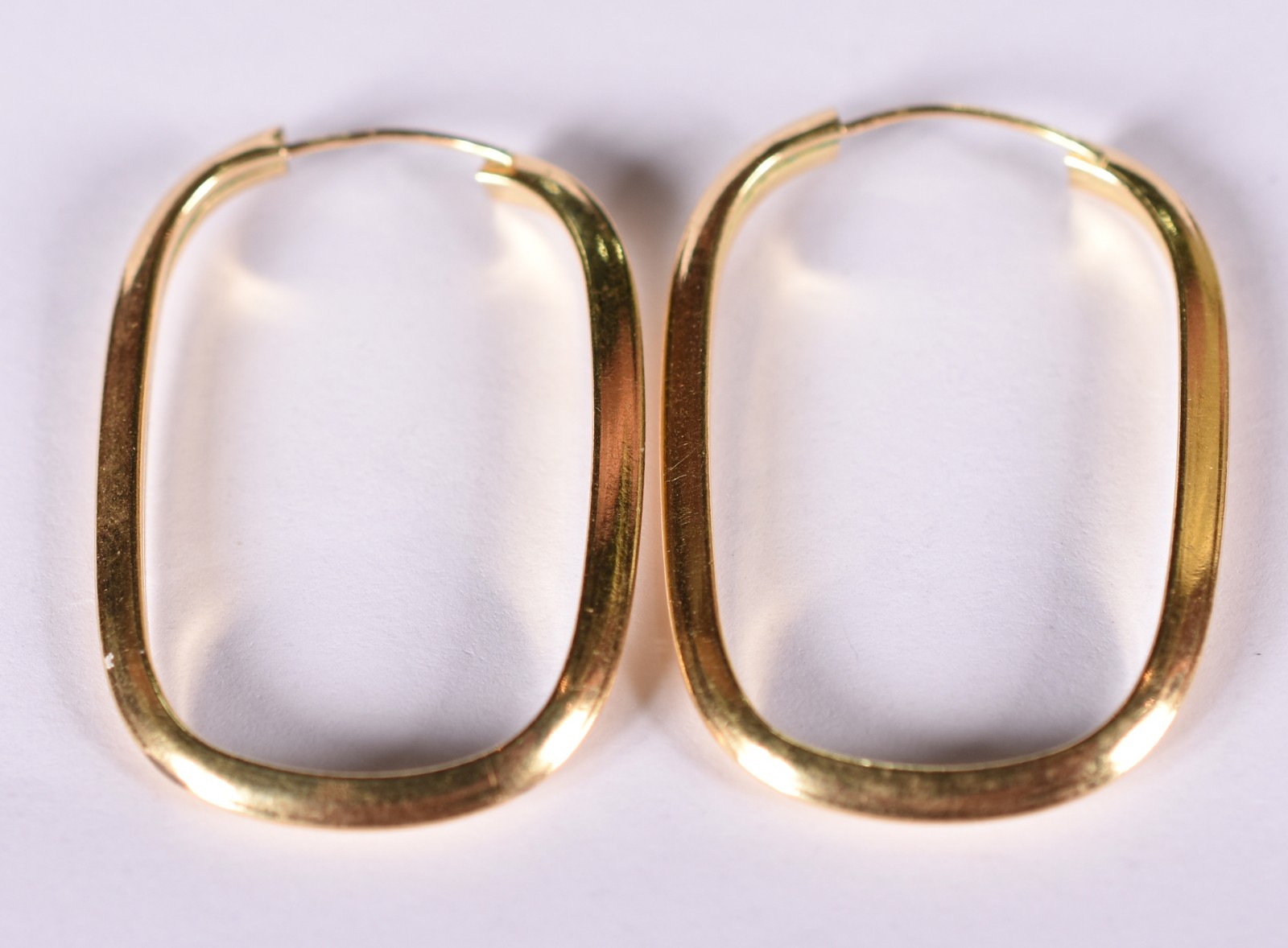 Par de brincos de ouro amarelo 18 k feitio oval (Por motivos de... - foto 3 de 3