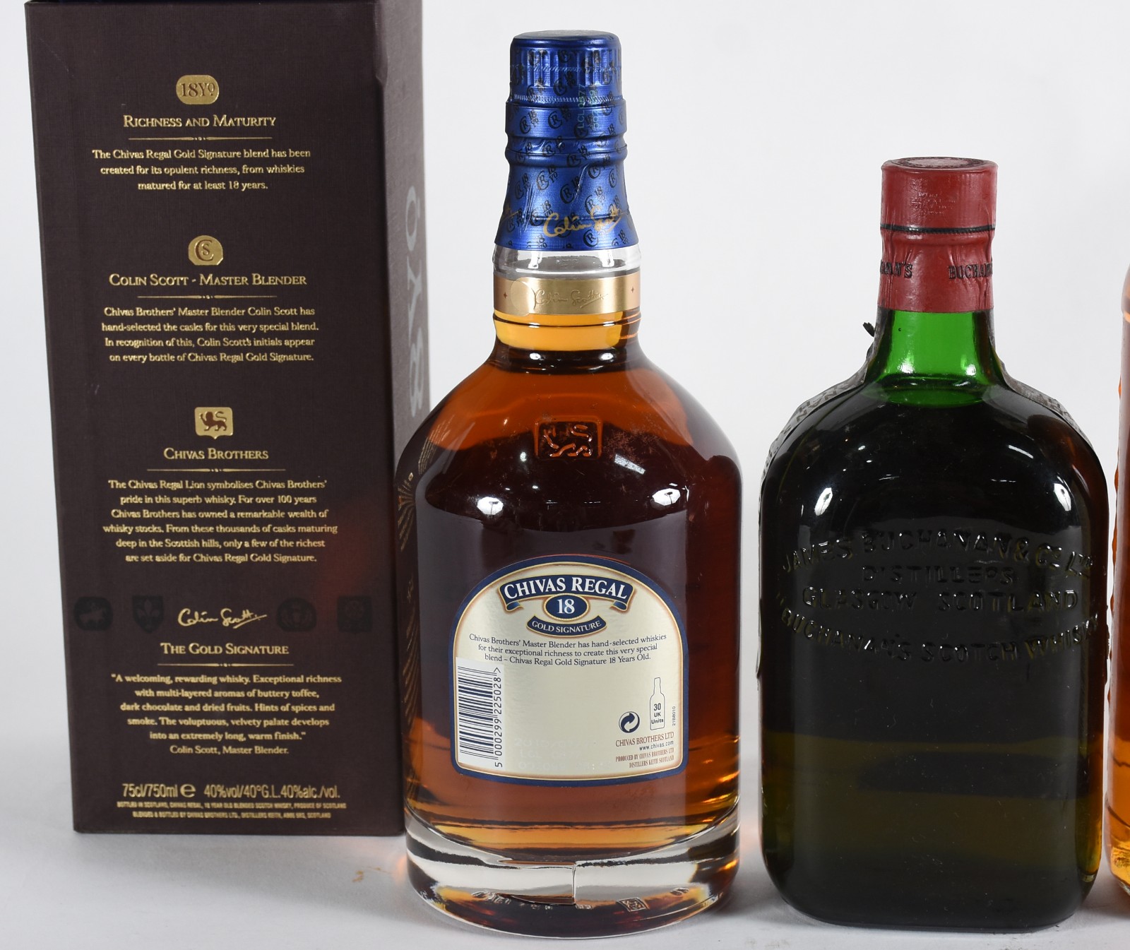 Quatro garrafas de whisky, sendo: Glenmorangie 10 anos, Buchanan's... - foto 3 de 4