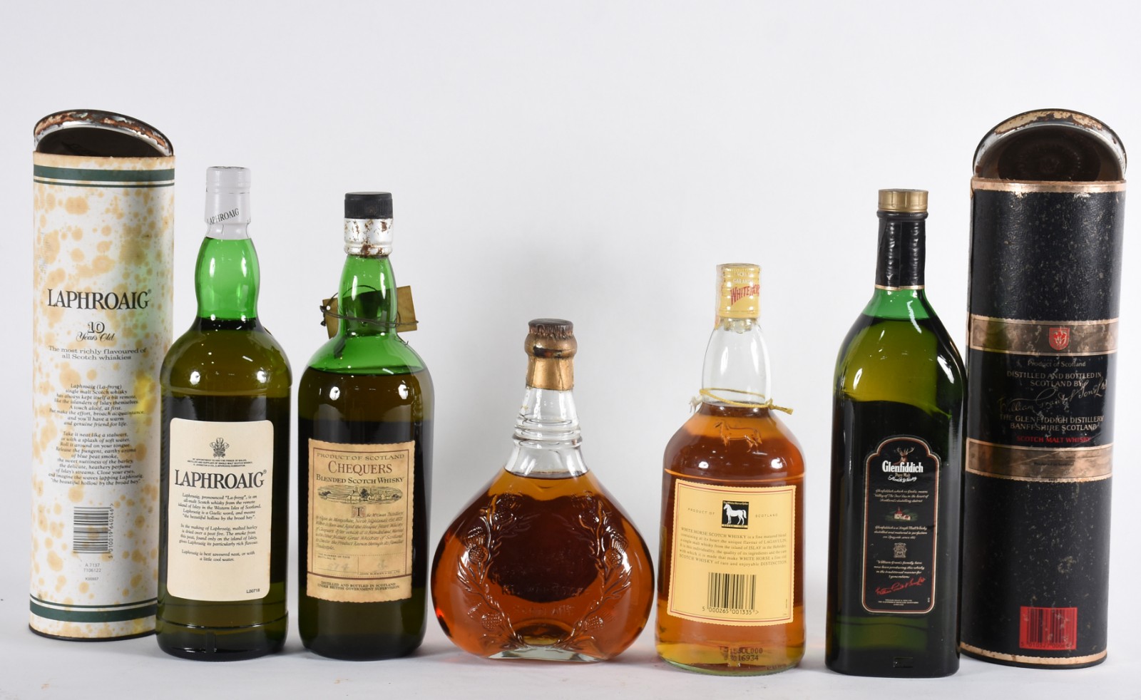 Cinco garrafas de whisky, sendo: Swing, White Horse, Chequers... - foto 2 de 4