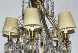 Lustre com estrutura de metal dourado e pingent... - Lustre com estrutura de metal dourado e pingentes de cristal lapidado, para 5 luzes.