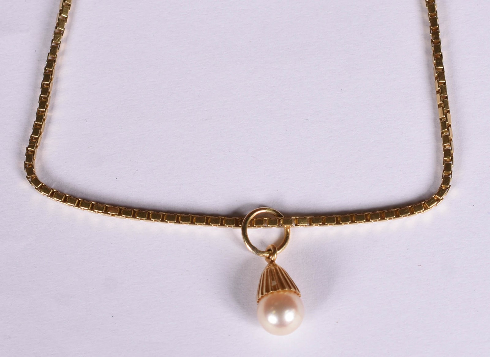 Pulseira de ouro 18 k e pingente de perolas (Por motivos de... - foto 1 de 4