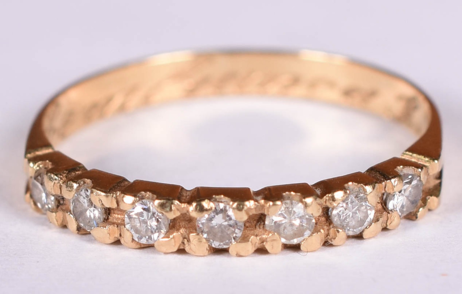 Anel de ouro 18 k com 7 brilhantes de 0,05 cada total 0,35 ct, aro 19... - foto 1 de 5