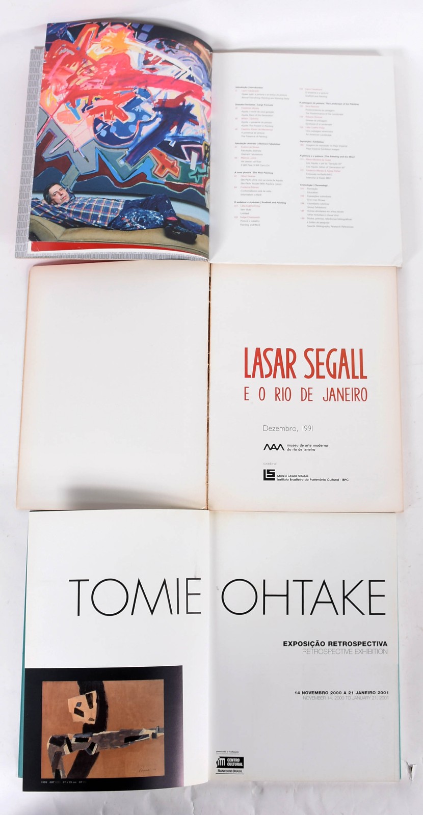 Três livros sendo, TOMIE OHTAKE, LUIZ AQUILA, SEGALL. - foto 2 de 5