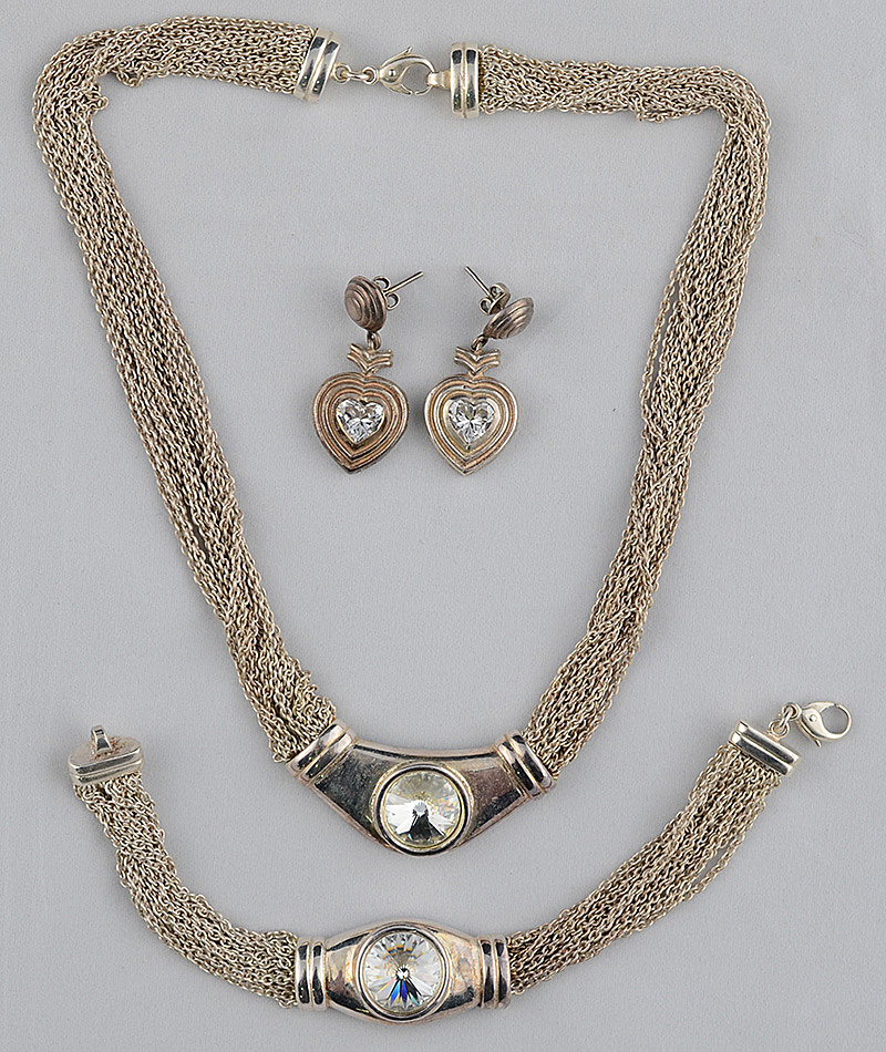 Conjunto de colar, pulseira e par de brincos de prata e zircone
