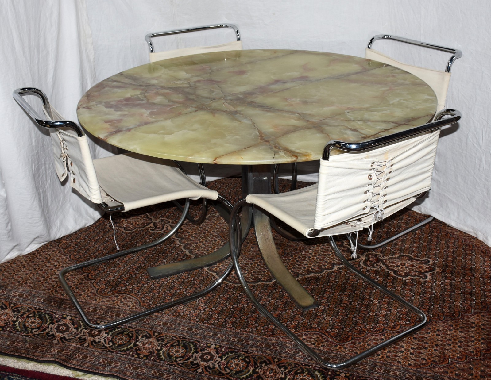 Conjunto de Mesa redonda com tampo de ônix e base de metal (oxidado)... - foto 1 de 11