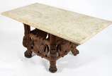 Mesa de madeira nobre com pé em florões ricamen... - Mesa de madeira nobre com pé em florões ricamente entalhados, arremates inferiores de metal,  tampo de mármore Bege Bahia fosco.