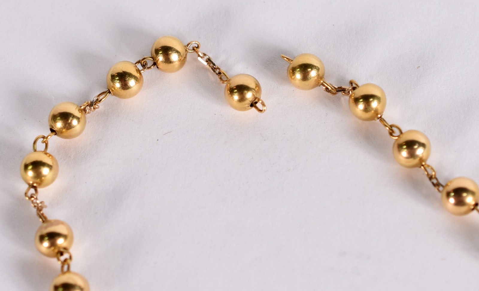 Cordão de ouro 18 k com bolinhas (elo solto, precisando consertar)... - foto 2 de 2