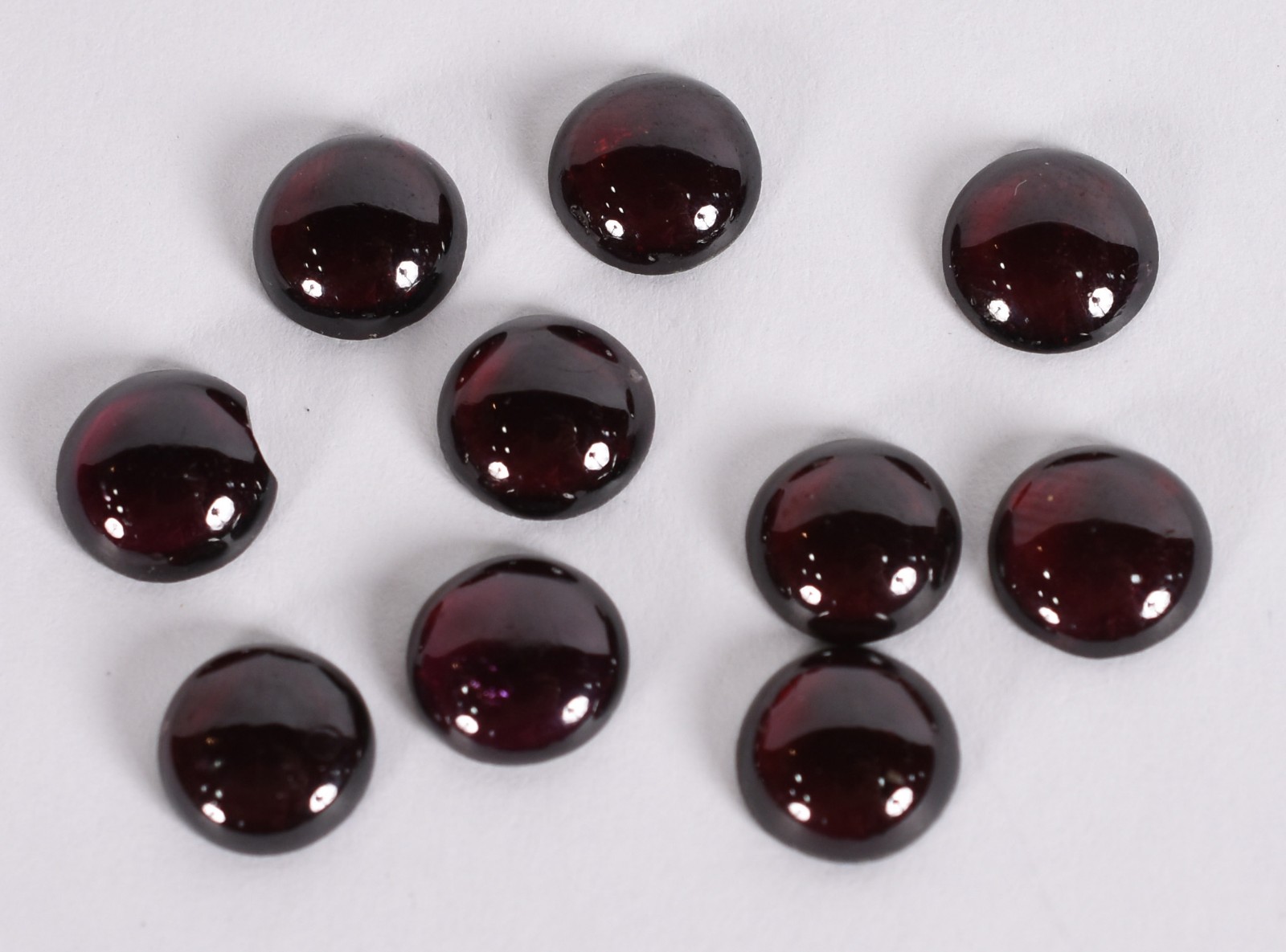 Dez rodolitas cabochões médios, com um quebrado (Por motivos de... - foto 1 de 2