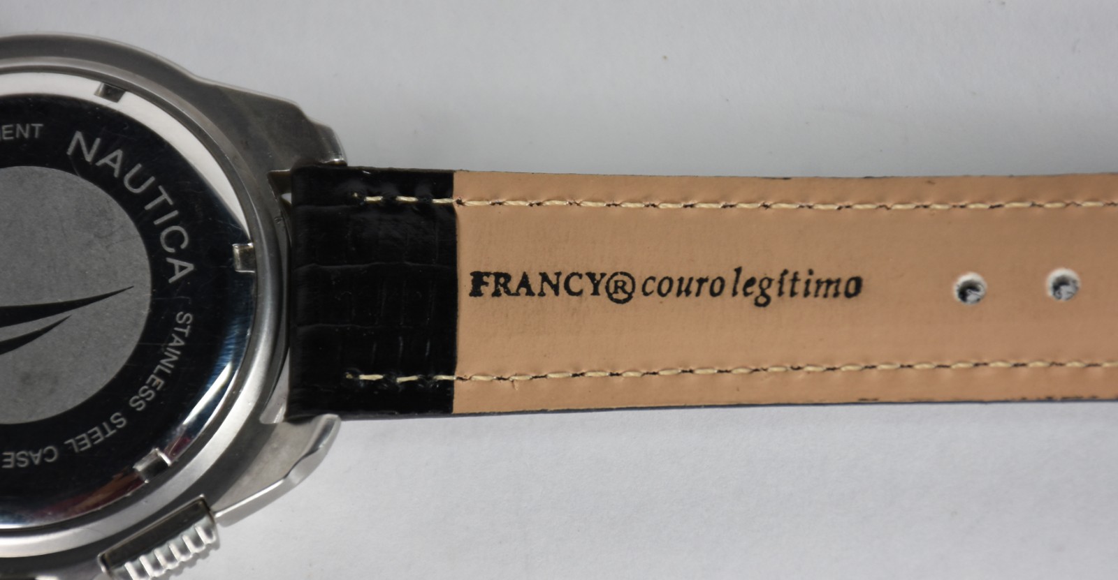 Três relógios sendo: Fossil, Calvin Klein, Nautica. - foto 8 de 10