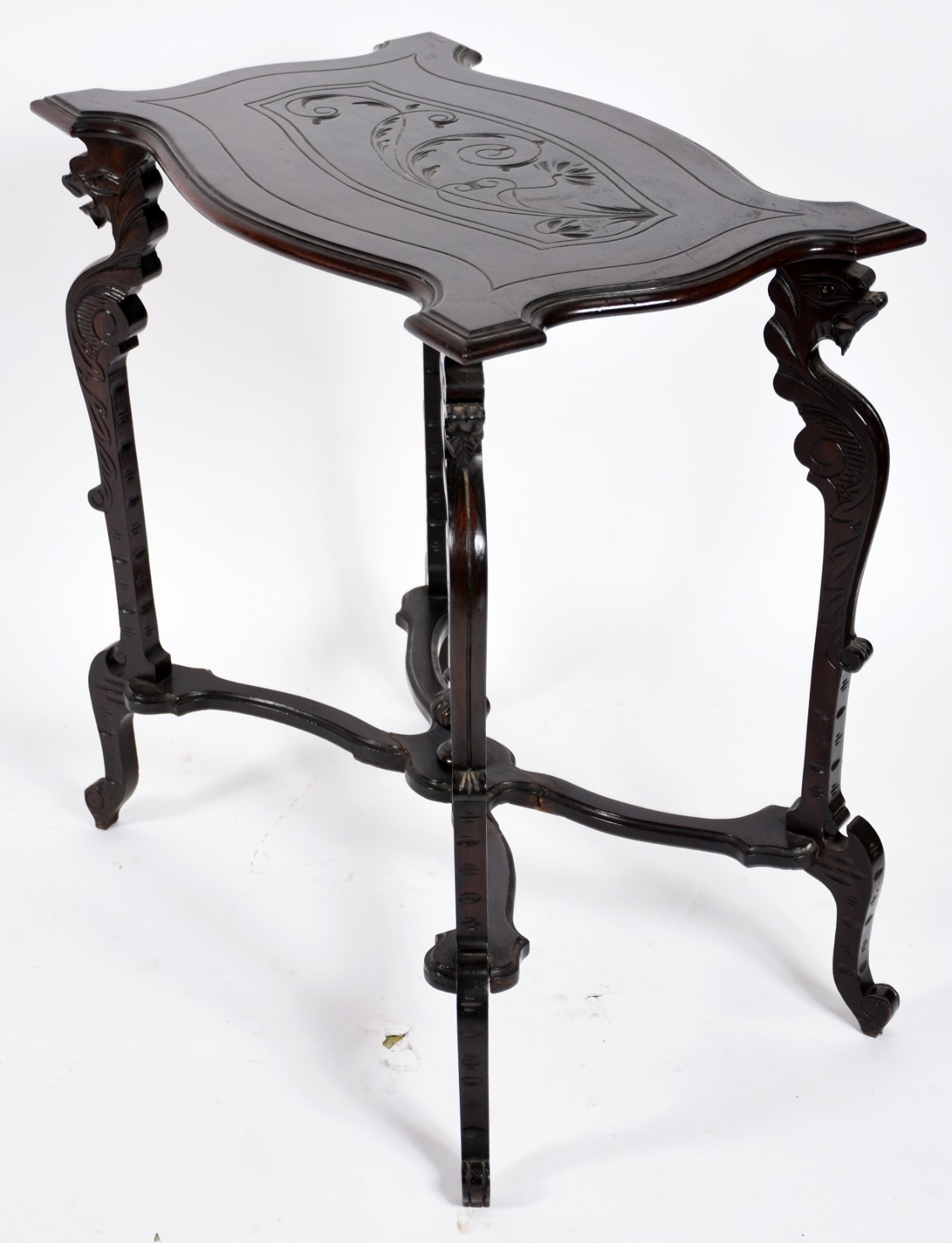 Mesa de madeira nobre com pernas recortada na forma de "figuras de... - foto 1 de 5