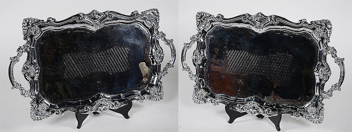 Duas badejas de metal prateado medindo 64,5 x 38 cm cada.