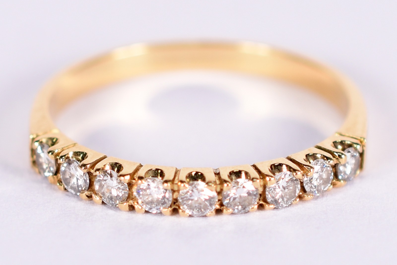 Anel de ouro 18 k com 8 brilhantes de 0,05 ct cada, total 0,40 ct... - foto 1 de 3