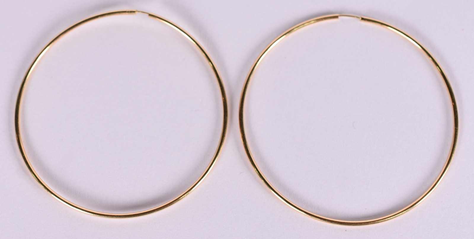 Par de argolas de ouro 18 k (Por motivos de seguranças as peças não... - foto 1 de 3