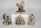 Quatro estatuetas de porcelana portuguesa - Alt... - Quatro estatuetas de porcelana portuguesa - Alturas 18 cm, 20 cm, 20 cm e 22 cm (uma com o dedo quebrado)