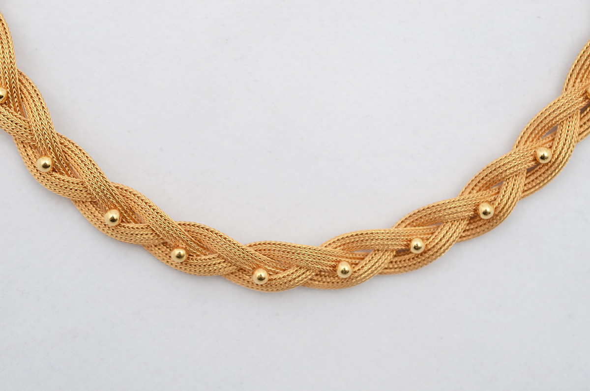 Colar em ouro amarelo 18 k 750 em forma de malha trançada com... - foto 2 de 2