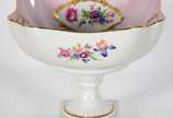 Fruteira de porcelana francesa de Limoges, deco... - Fruteira de porcelana francesa de Limoges, decoração floral em policromia com realces dourados.