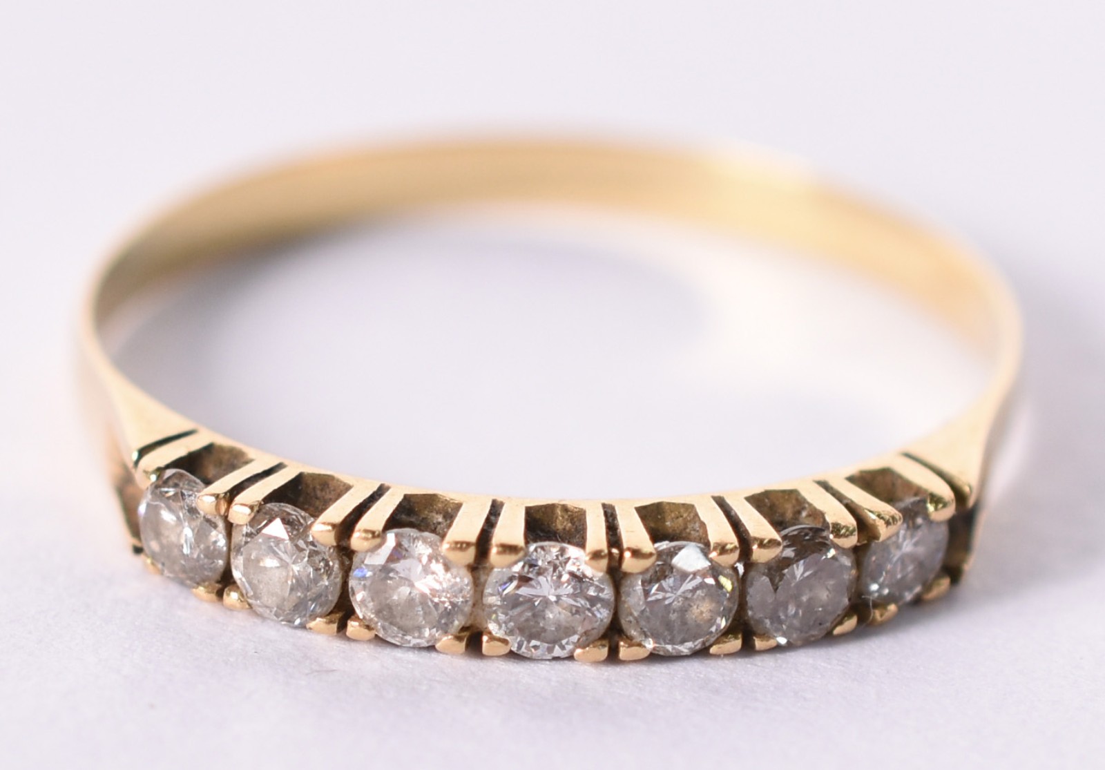 Anel de ouro 18 k com 7 brilhantes de 0,05 ct cada, total 0,35 ct... - foto 1 de 3