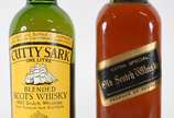 Quatro garrafas de Whisky sendo, 1 Black Label,... - Quatro garrafas de Whisky sendo, 1 Black Label, 1 Buchanan's, 1 Balantine's, 1 Cutty Sark.