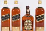 Quatro garrafas de Whisky sendo, 3 Black Label,... - Quatro garrafas de Whisky sendo, 3 Black Label, 1 Chivas Regal.