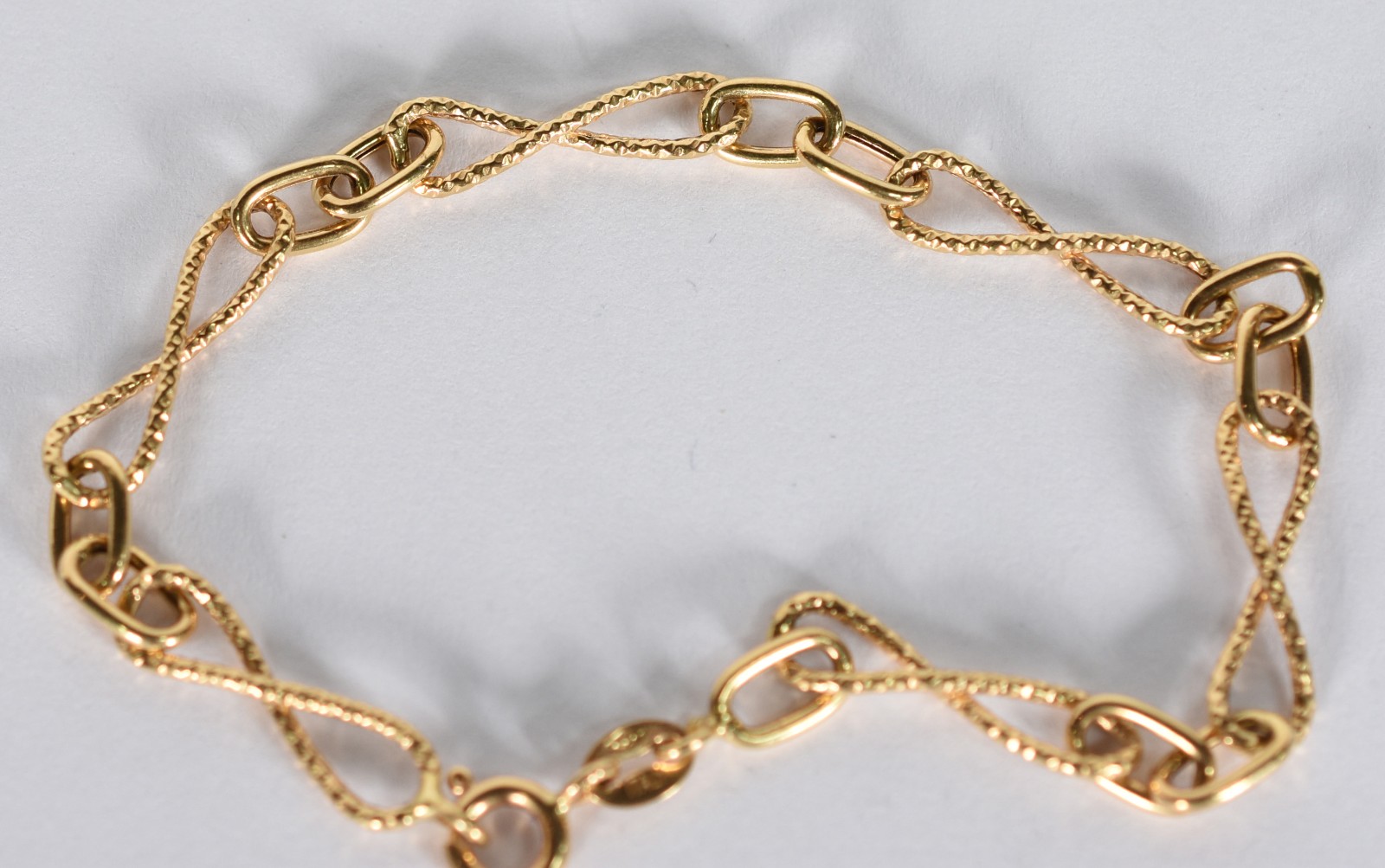 Pulseira de de ouro amarelo 18 k, elos no feitio de oito... - foto 3 de 3